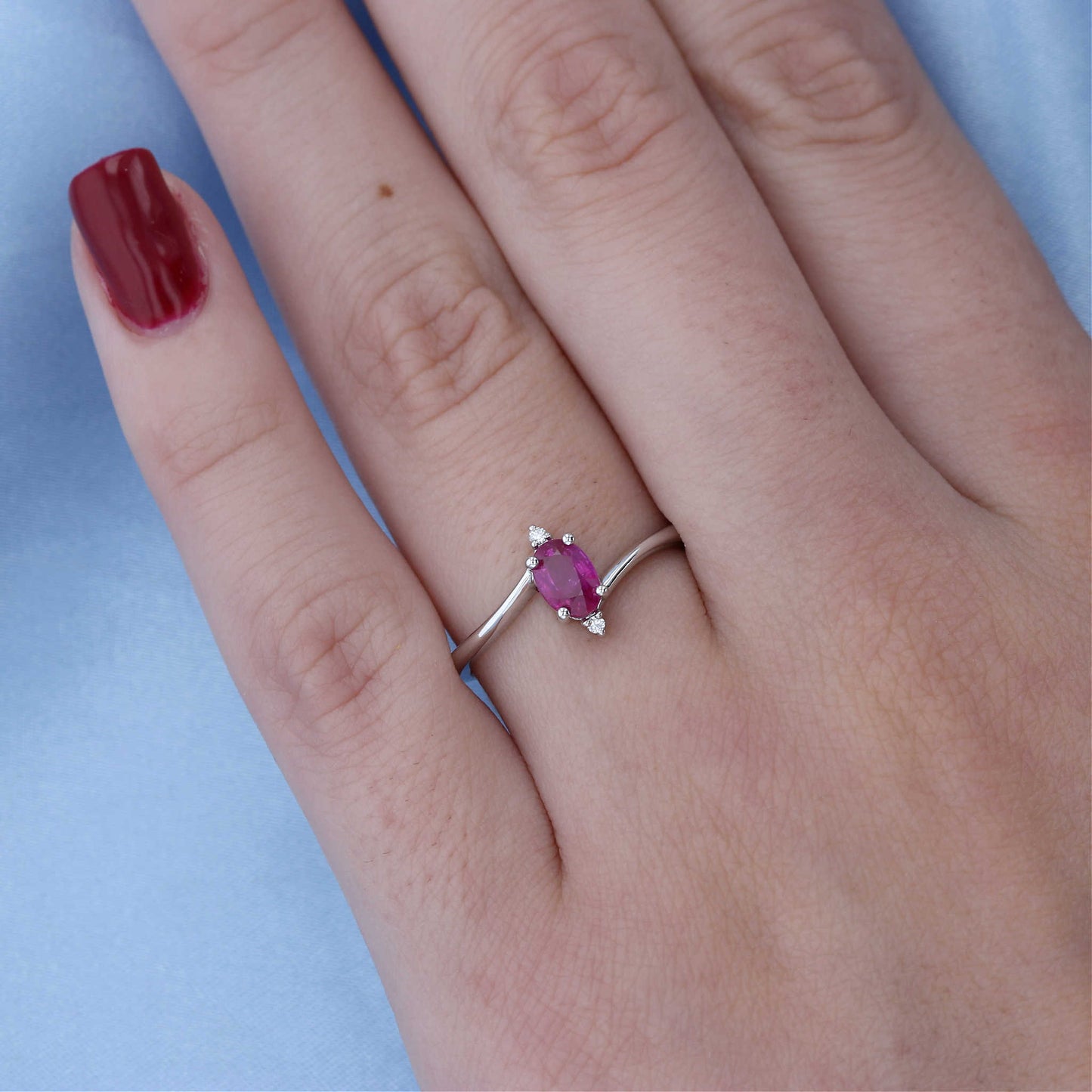 White Gold Oval Ruby Bypass Ring