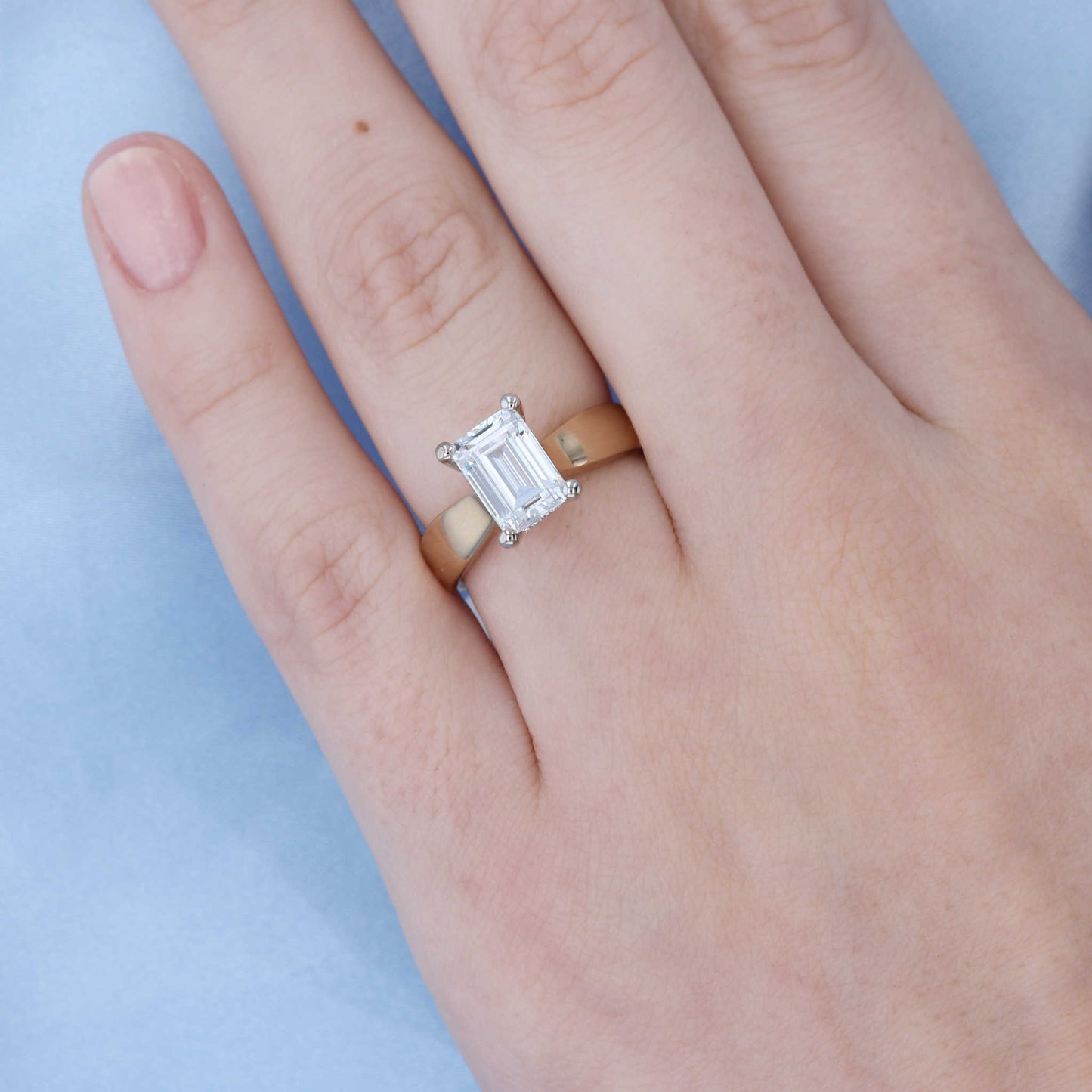 Wide Solitaire Emerald Cut Engagement Ring