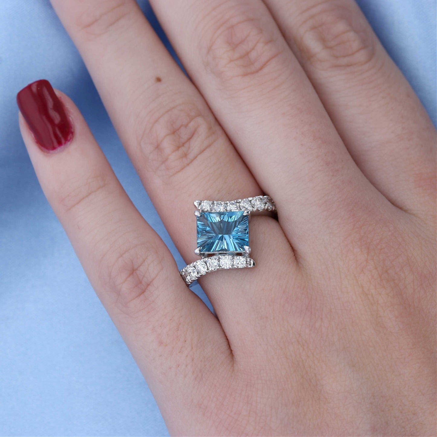 White Gold Blue Topaz Bypass Ring