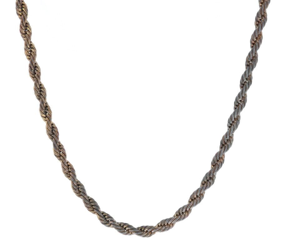 A yellow gold chain turned black from forgetting it on a boiling stove.