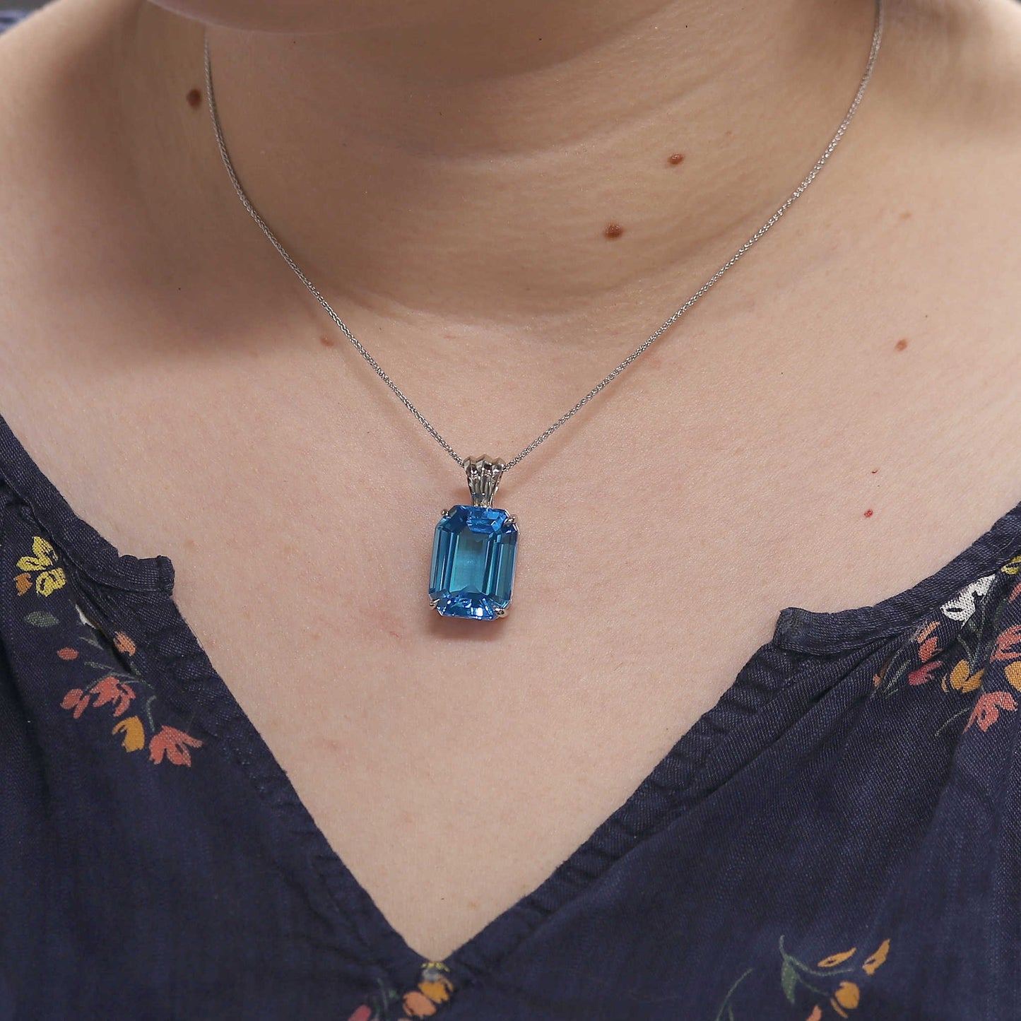 White Gold Emerald Cut Blue Pendant