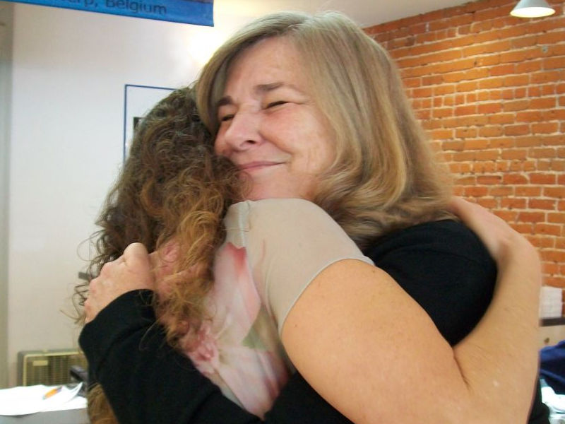 Recipient of Free Necklace for Valentines hugging Debbie Fox