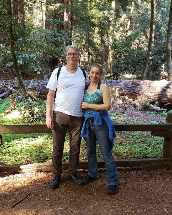 George and Debbie Fox in a forest