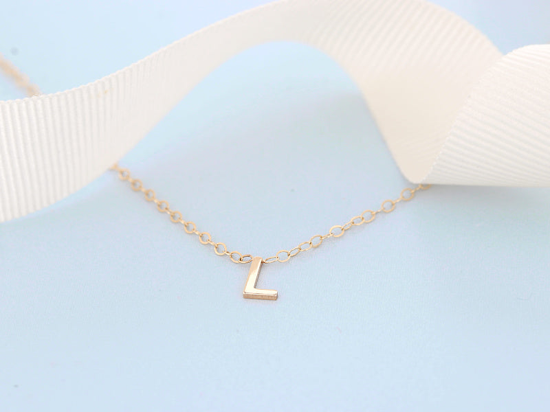 14k yellow "L" initial necklace and ribbon
