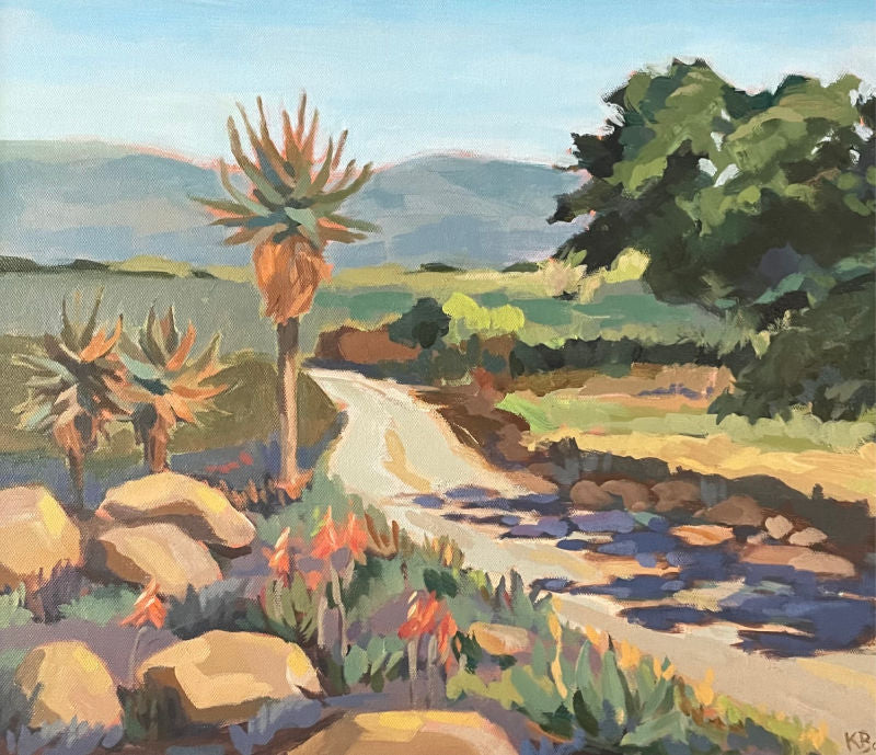 Painting of a landscape with cacti and a road by Kathy Bodycombe