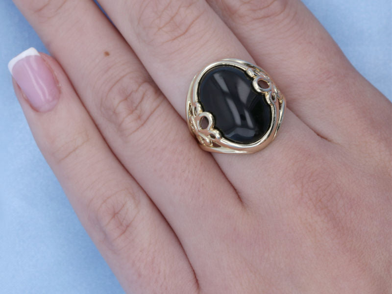 Large onyx yellow gold floral ring