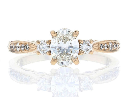 custom three stone ring with diamonds on the side