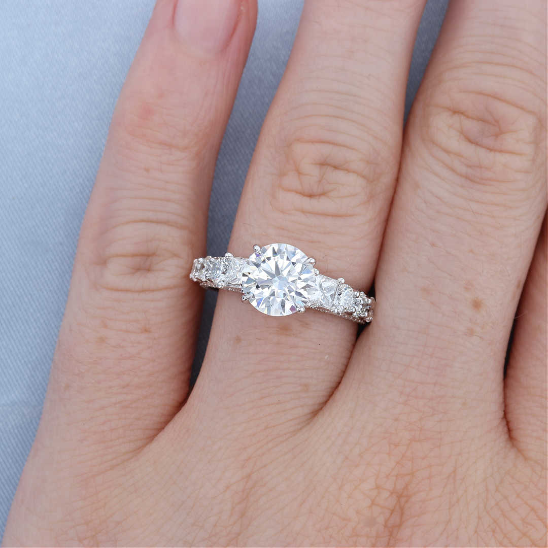 Princess Cut Diamond Side Stone Engagement Ring