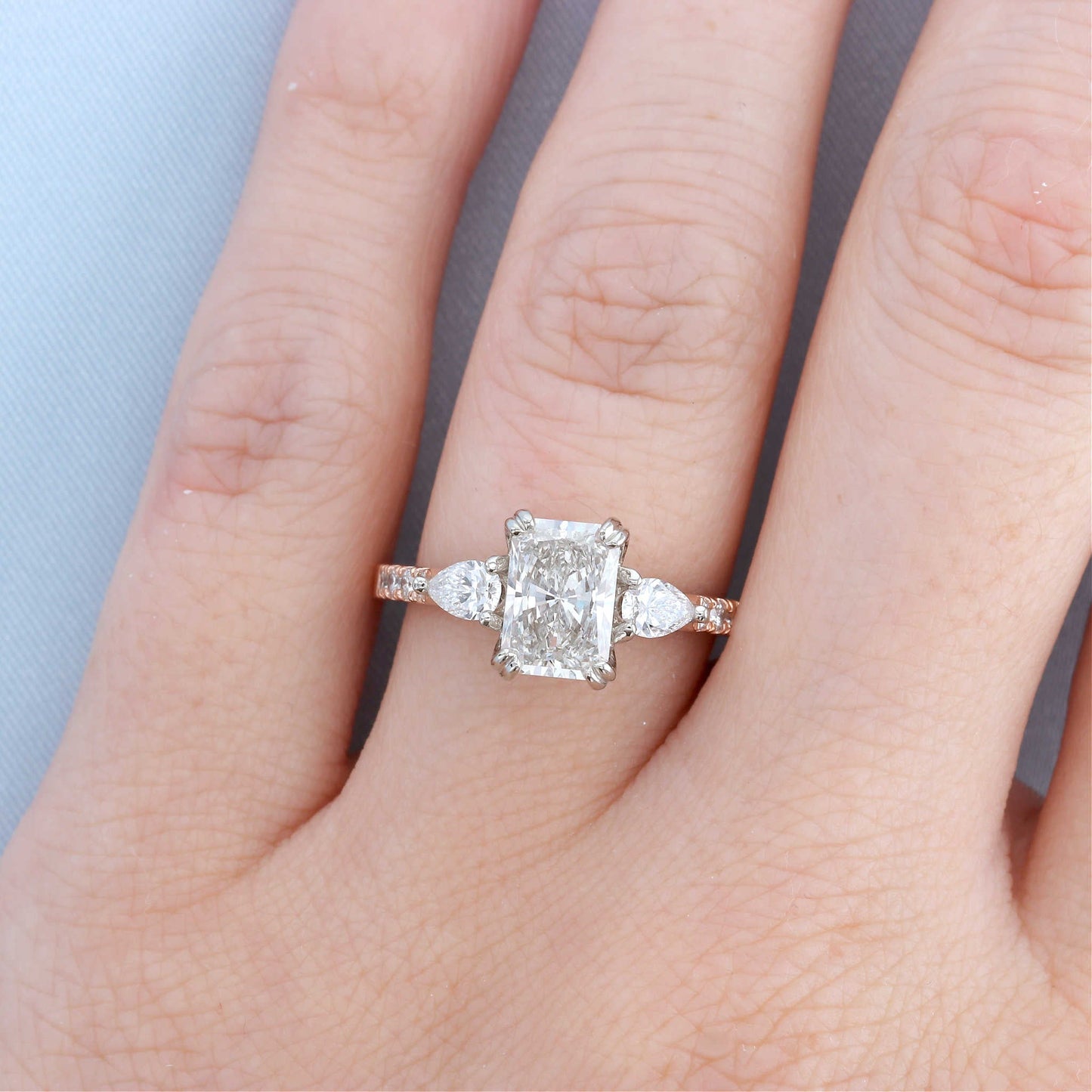 Two Tone Three Stone Radiant Diamond Engagement Ring