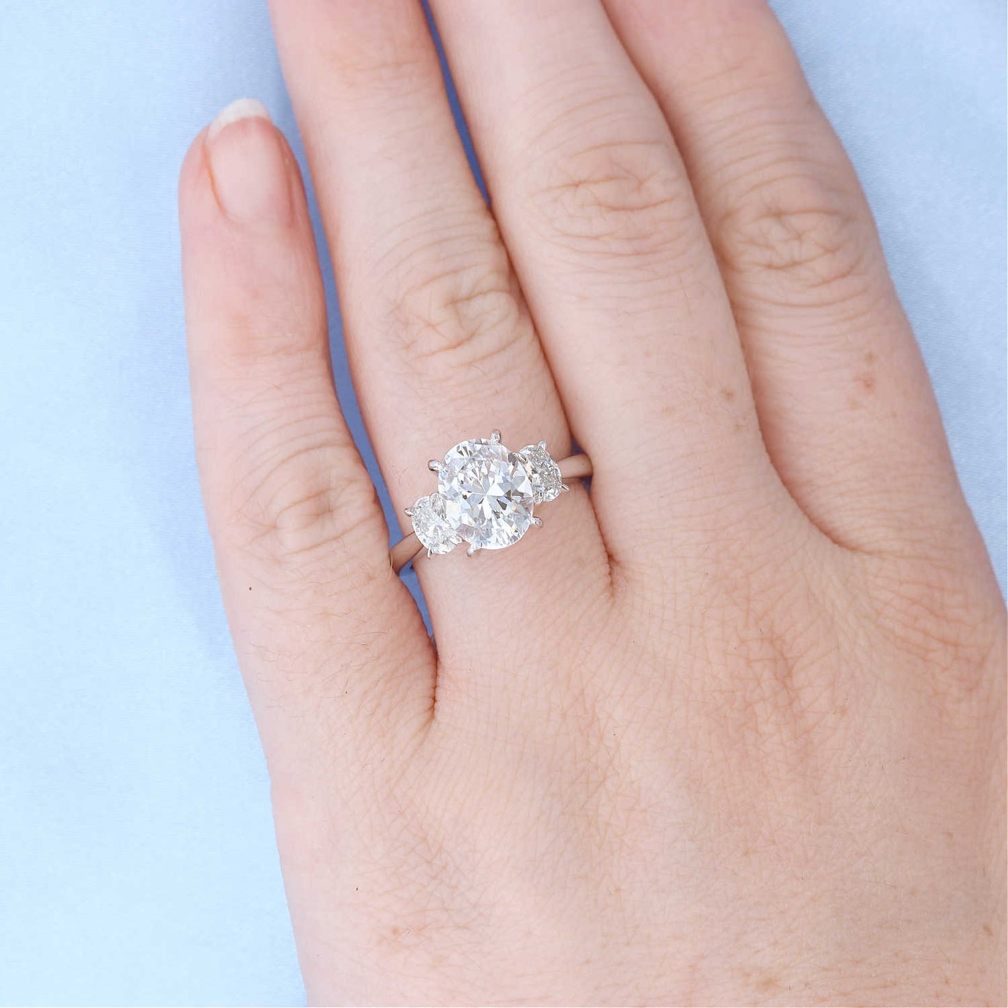 Three Stone Oval Diamond Engagement Ring