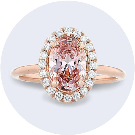 Rose gold pink diamond halo ring