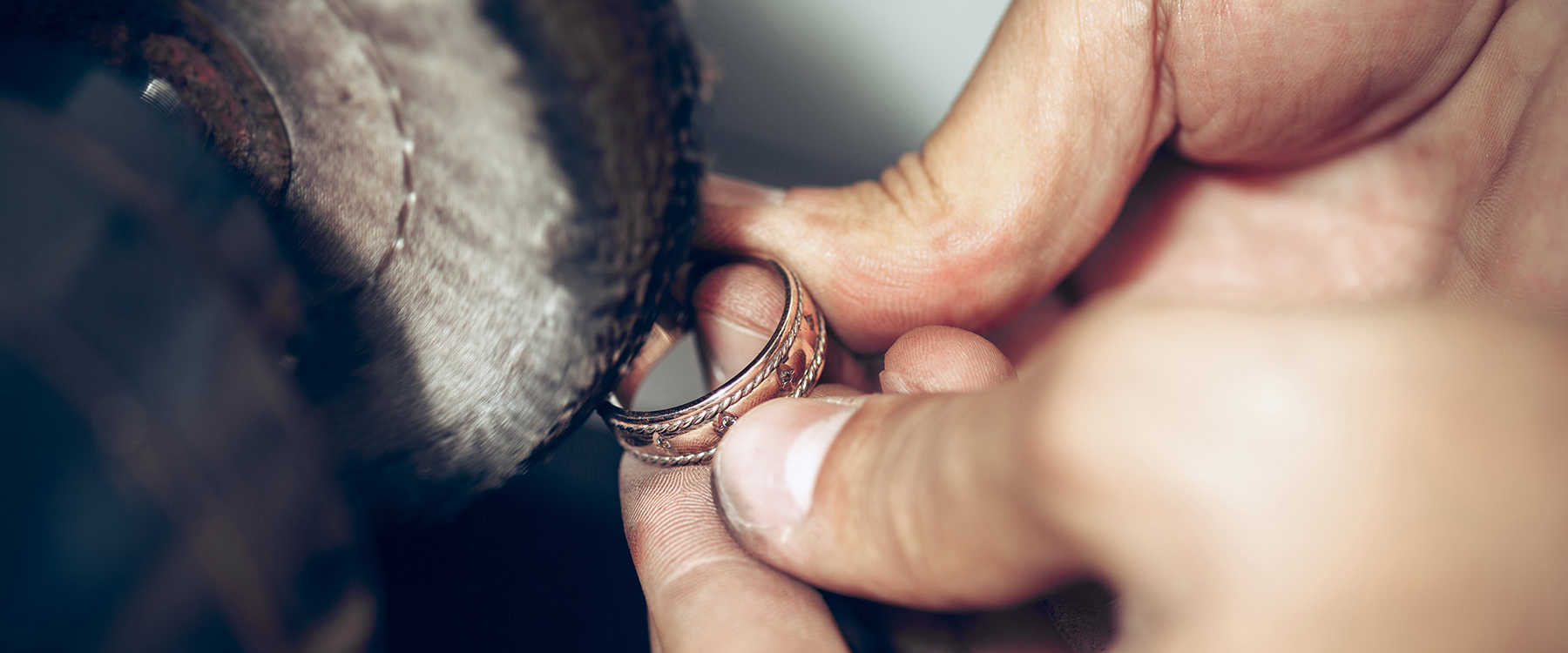 Rose gold ring being polished