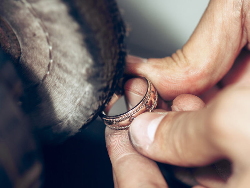 Rose gold ring being polished