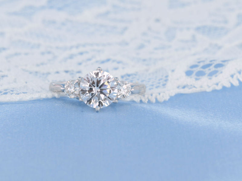 Three stone diamond engagement ring
