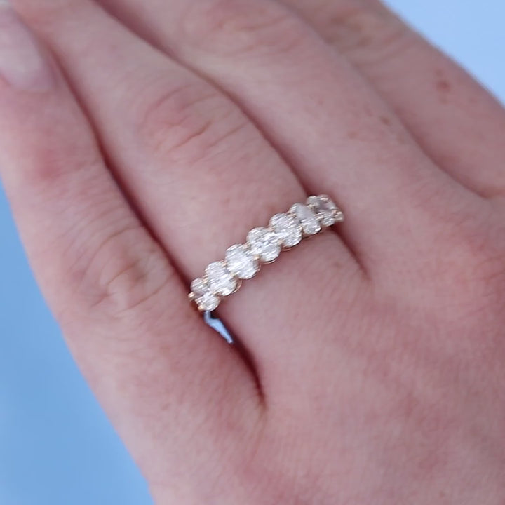 Oval Diamond Wedding Band on a Finger