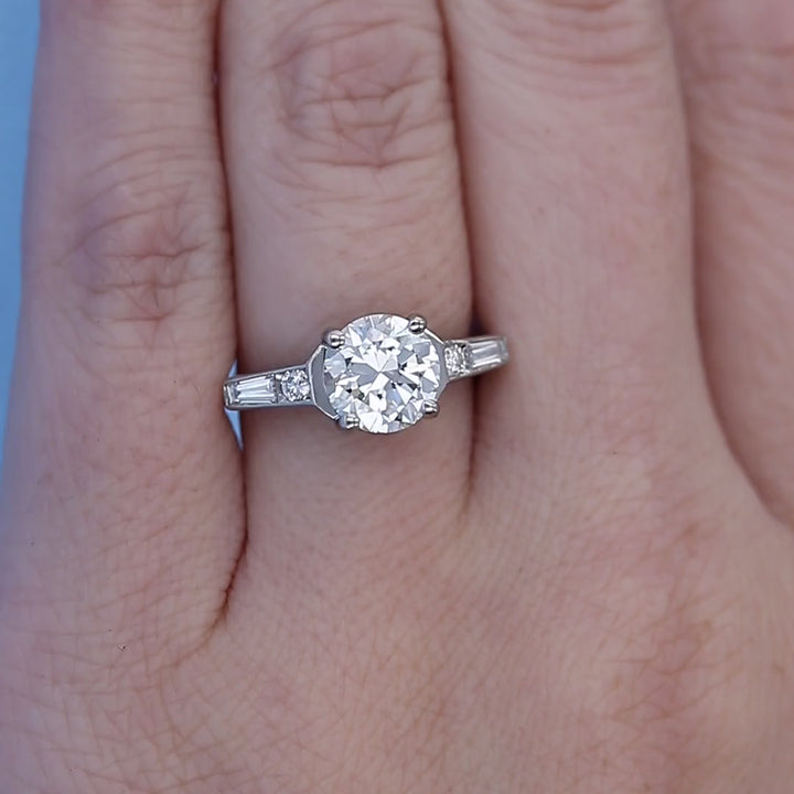 Vintage Old Euro & Baguette Diamond Engagement Ring on a Finger