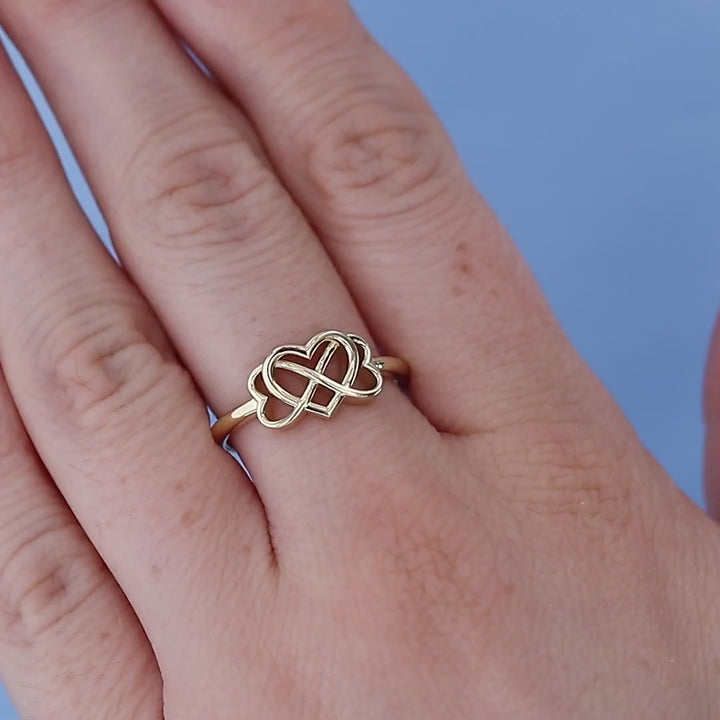 Infinity Heart Ring on a Finger