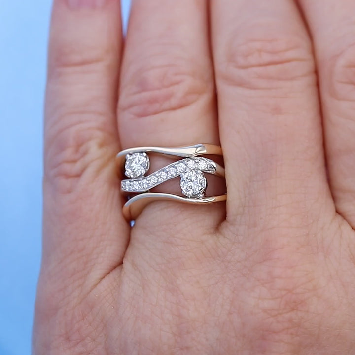 Unique Two Tone Wave Two Diamond Engagement Ring on a Finger