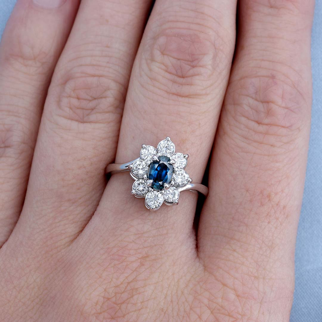 Sapphire & Diamond Halo Bypass Replica Ring on a Finger