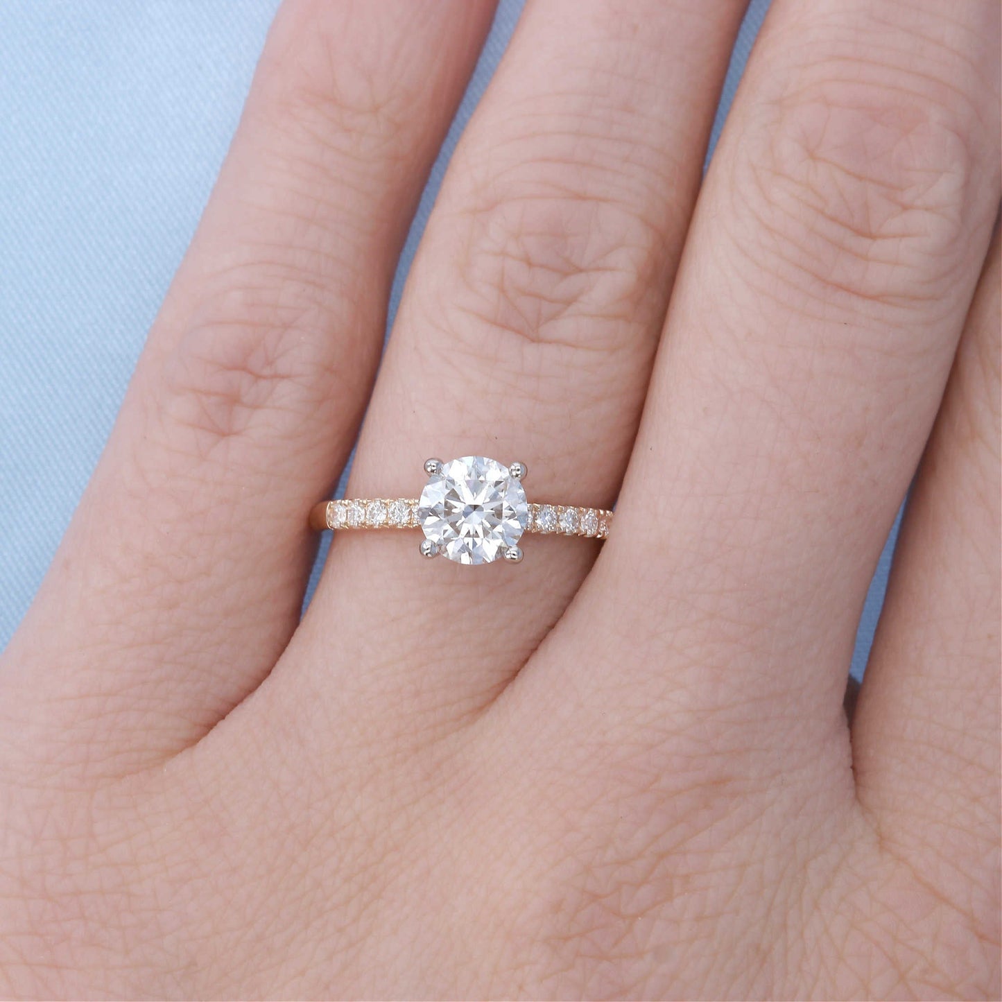 Two Tone Diamond Engagement Ring on a Finger