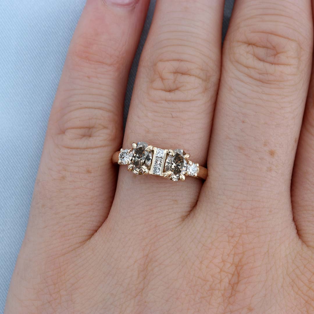 Unique Two Stone Champagne Diamond Engagement Ring on a Finger