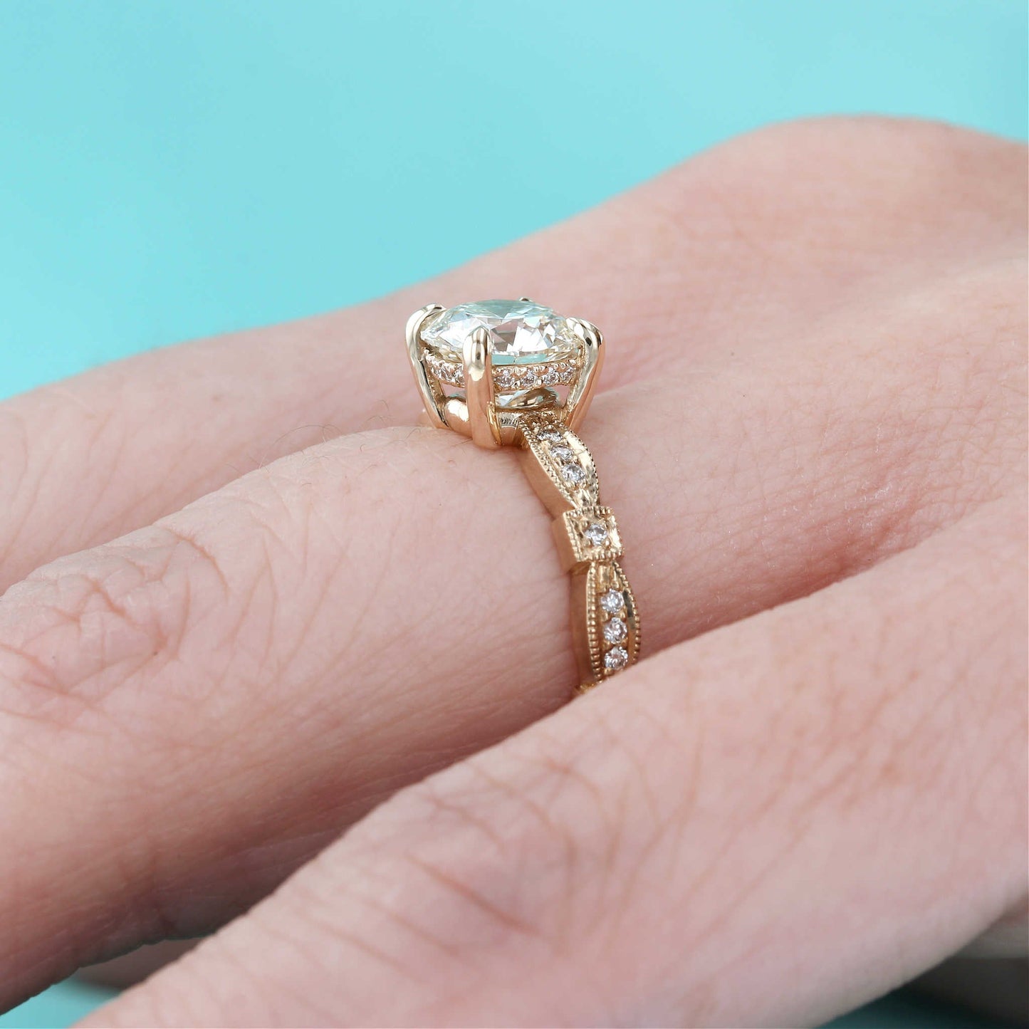 Vintage Hidden Halo Diamond Engagement Ring on a Finger