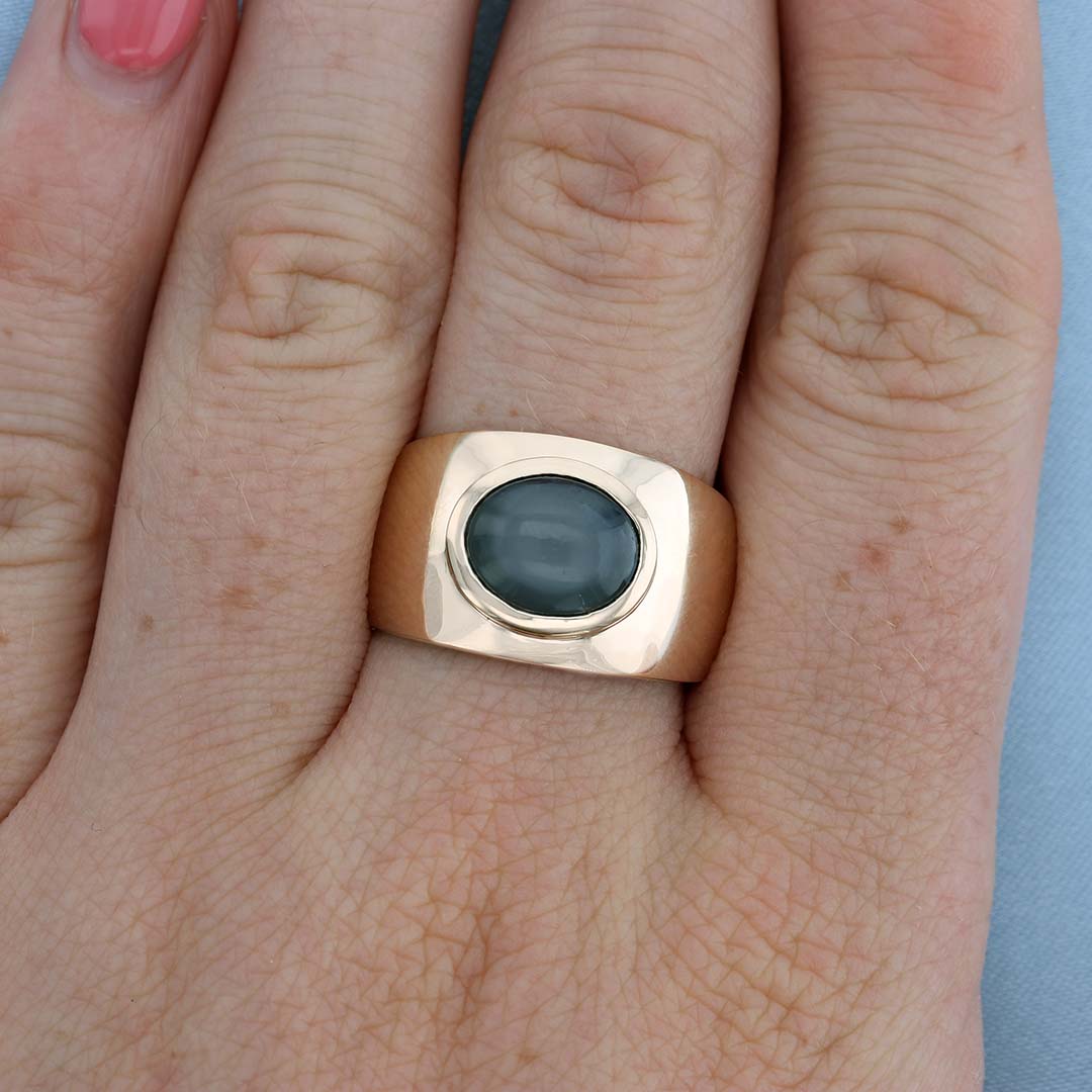 Bezel Set Star Sapphire Ring on a Finger