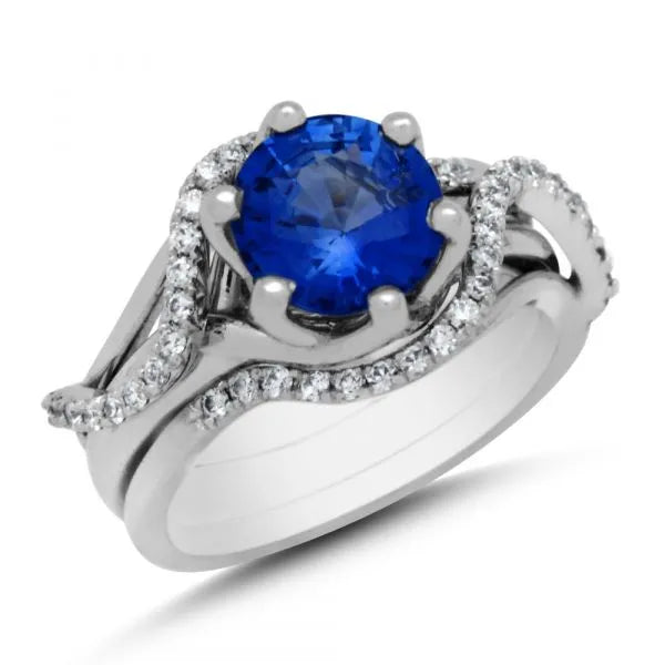 Round blue sapphire engagement ring and wedding band