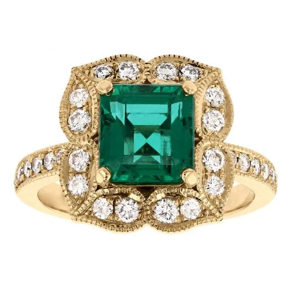Antique emerald ring with floral diamond halo